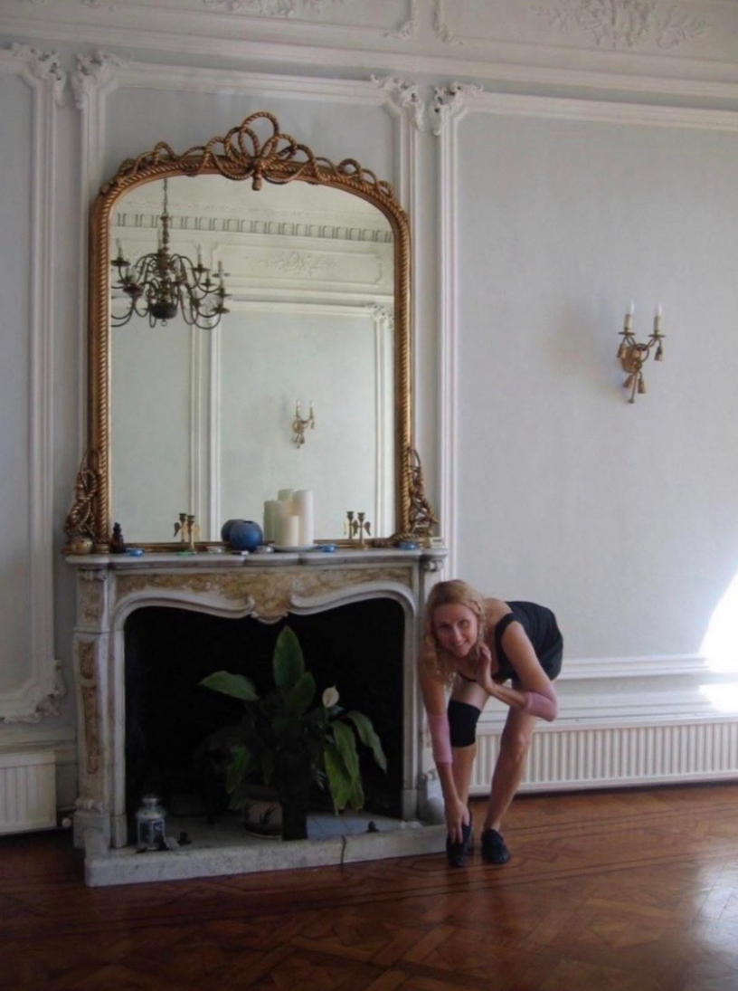 Marita by fireplace